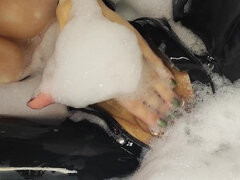 Taking a Bath in a Back Latex Catsuit