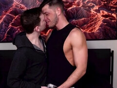 Tanned stud with a six pack is naked with his partner