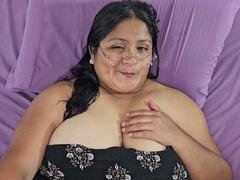 Latin Rain plays with her goo and cum in a solo session