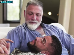 Tattooed and pierced hunk gets fucked in threesome by boyfriend and gay daddy