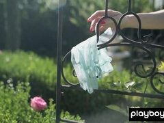Skinny naked blondie watering her plants