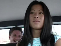Asian chick Sunshine cums several times in the van