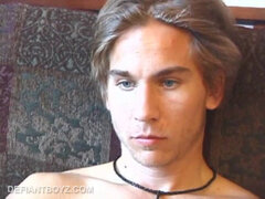 Stripped and Tuned Into a Porn Video, Scruffy Brock Strokes his Stiff Cock