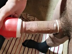 Fucking a Tenga cup with a condom and then filling the condom with my piss!