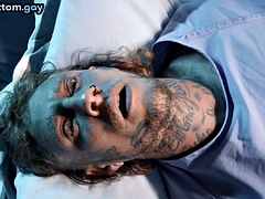 Doctor inserted an anal plug into a tattooed gangster