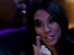 Asian beauty sucks a big, black cock
