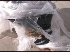 Kayla Bound Gagged And Wrapped In Plastic