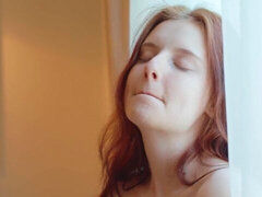 Sweet redhead chick Sienna is having fun with her hungry wet snatch