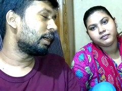 Newlywed couple and their friend getting cozy in an Indian village