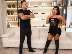 Beauty in black high-heeled boots Lina Henao opens her shaved pussy