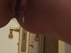 She pisses on her slave in the bathroom