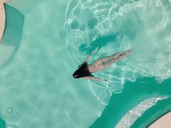 Young gorgeous brunette Irina sivalna solo outdoors in the pool - wet babe