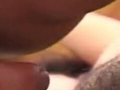 Hooded while sucking cock masturbates pussy