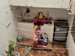 The Neighbor Is Watched Washing Clothes by Her Neighbor