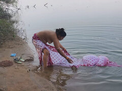 Indian Village Wife Bathing in the River in Outdoor Area