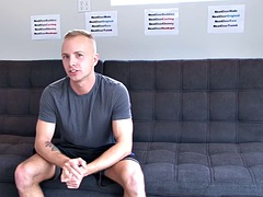 Hot jock loves to stroke his huge cock while moaning loudly