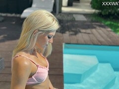 Candee Licious, the epitome of sensitivity and allure by the pool