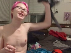 Playful girl teasing her tits and serenading you while doing laundry