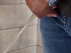The Guy Takes a Selfie as Plentifully Long Pissing in the Toilet