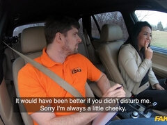 Instructor takes dick out of his pants to help a brunette