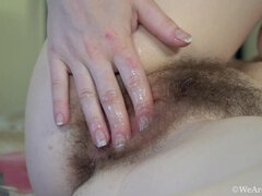 Elouisa strips and masturbates in her bed