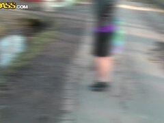 Busty girl gives public blowjob