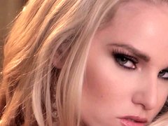 Blonde with natural jugs is in a single video, teasing her nipples