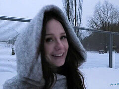 Angie Lynx struts in high stiletto heels on icy snow