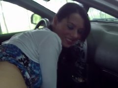 Cute young wife gives her man a blowjob in the car