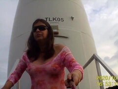 I show my hooters in an industrial park