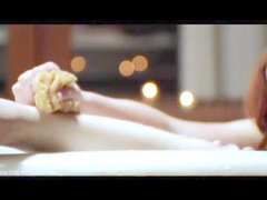 Salacious redhead Elle Alexandra washes herself in the bath and then rubs her clean pussy