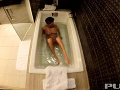 Jezebelle Bond films herself taking a bath