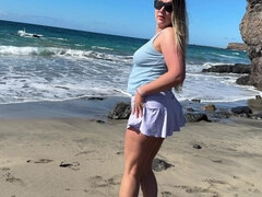 Girl Peeing and Wetting Skirt Pants at the Public Beach