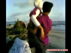 Indonesian- hijab girl fucks on the beach