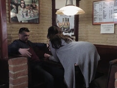 MILF with massive fake boobs sucking cock in the bar