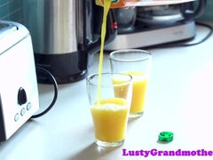 Lovely granny fingered in the kitchen