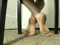 Restless feet under chair