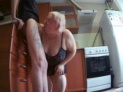 Neighbor ravages me in the kitchen and feeds me his cum