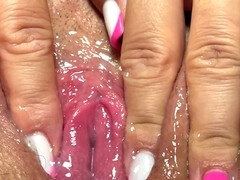 Snezana's wet close-up reveals her perfect pink pussy with some lube and lust