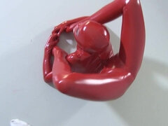 Flexible Slut In A Red Latex Catsuit - Flexible