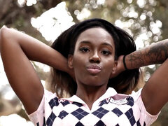 Watch this tattooed ebony babe in reverse cowgirl ride a BBC while wearing long socks and panties