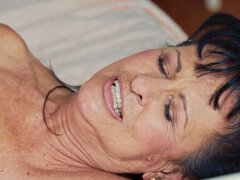 Skinny lad with a big dick handles a GILF like a champ