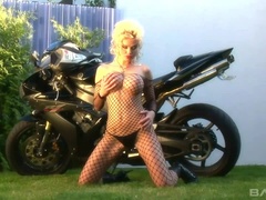 gorgeous blonde Caylian Curtis masturbates on her motorcycle in lingerie