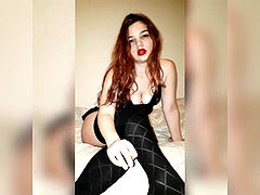 teen red-haired in stocking and lingerie smoking cigarette