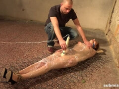 Wrapped in plastic cleavegagged titgrabbed