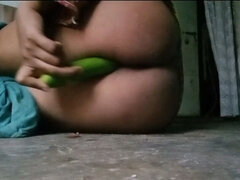 Hot Bhabi Taking Cucumber and Having Fun Wirh Boobs