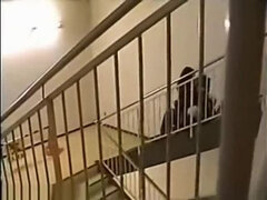 Couples flirting inside of a building