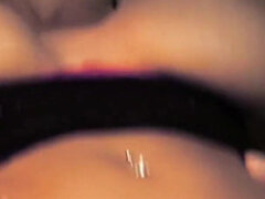 Horny brunette gives head to this dude with her friend at the same time