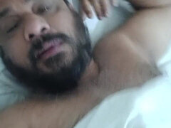 Indian Daddy Lying on the Bed Teasing and Posing for You