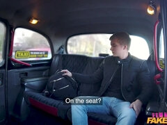 A slutty lady driver does naughty things to a passenger in the taxi cab